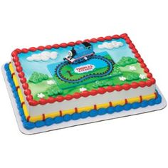 a thomas the train birthday cake on a plate