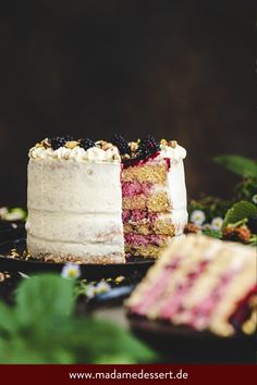 a cake on a plate with the words brombeertorte mit joghurt - creme - flulling