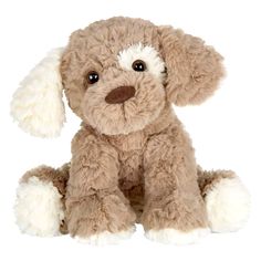 a brown stuffed dog with white fur on it's face and ears sitting down