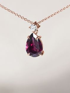 Necklace made of 14k rose gold with dark, red-violet drop and a diamond. Rhodolite gemstone will bring you energy, courage and joy in 2023. Romantic Necklace, Red Violet, Prague, Gemstone Necklace, Dark Red, Violet, Rose Gold, Energy, Gemstones