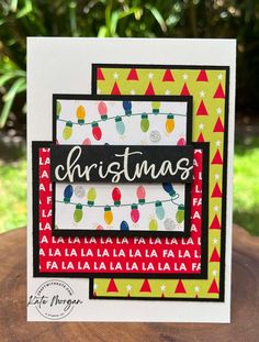 a card with christmas lights on it