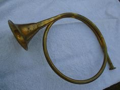 an old brass horn on a towel