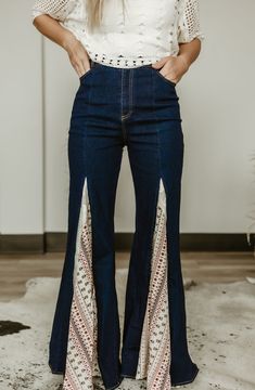 Unleash your wanderlust with our Mix Media Lace Detail Wide Leg Jeans. These unique jeans feature an asymmetrical front zipper fly, contrast lace detailing, and functional front pockets with a 34 inch inseam. Get ready to make a statement while staying comfortable in these quirky and stylish flare jeans! Lace Bell Bottoms, Bell Bottoms Jeans, Oc Things, Jeans Crafts, Upcycling Clothes, Birthday Things, Unique Jeans, Garment Construction, Lifestyle Branding