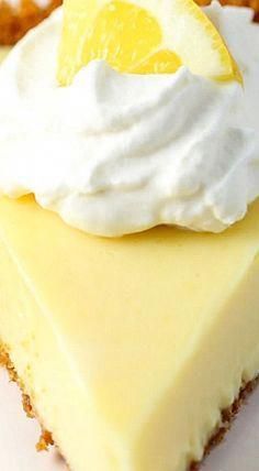 a slice of lemon pie with whipped cream on top