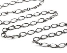 Gunmetal Etched Horse Eye & Ring Chain will add eye-catching interest to your designs. The larger textured link is complemented by a smaller soldered link, 21 gauge wire. We have hundreds of chains that are sold by the foot. Order however much you need and we'll cut it for you. Our chains range from basic cable chain to intricate, fancy styles. They come in a variety of metals, so you're sure to find what you need. Shop by metal or style below! Chain Size Chart, Horse Eye, Ring Chain, Beads Online, Bead Store, Eye Ring, Chain Ring, Base Metal, Cable Chain