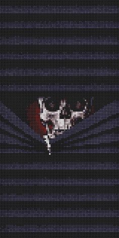 a cross - stitch image of a man falling off his skis