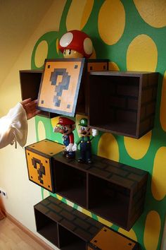 a nintendo themed room with mario and luigi's furniture on the wall, including shelves