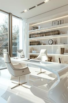 an office with white furniture and lots of books on the shelves in front of large windows