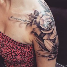 a woman with a rose tattoo on her shoulder