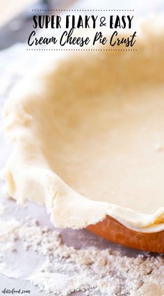 an uncooked pie crust on top of a floured pan with the words super easy and easy cream cheese pie crust