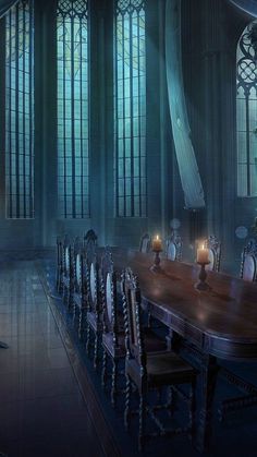 a long table with candles on it in front of large windows and gothic - style architecture