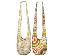 two purses with different designs on them, one is white and the other is multicolored