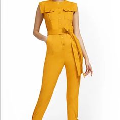 Nwt Two-Pocket Ankle-Tie Utility Jumpsuit In A Rich Gold Color. Sold Out ! Bx#1 Casual Yellow Jumpsuits And Rompers For Work, Casual Workwear Jumpsuit With Flap Pockets, Summer Workwear Jumpsuits And Rompers With Pockets, Spring Yellow Jumpsuits And Rompers With Pockets, Yellow Fitted Jumpsuits And Rompers With Pockets, Fitted Yellow Jumpsuits And Rompers With Pockets, Yellow Sleeveless Jumpsuits And Rompers For Work, Yellow Sleeveless Jumpsuit For Work, Spring Workwear Jumpsuits And Rompers With Patch Pockets