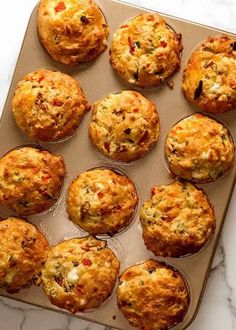 several muffins are sitting on a baking sheet