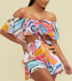 This tropical printed romper is uberly cute and stylish! Model is wearing a size small. Summer One-piece Jumpsuits And Rompers With Ruffles, Summer Ruffle Jumpsuits And Rompers, Summer Ruffles One-piece Jumpsuits And Rompers, Summer Ruffled One-piece Jumpsuits And Rompers, Summer Bubble Romper With Ruffles For Beach, Summer Beach Mini Jumpsuits And Rompers, Summer Beach Jumpsuits And Rompers Mini Length, Summer Vacation Bubble Romper With Ruffles, Summer Jumpsuits And Rompers With Ruffles For Day Out