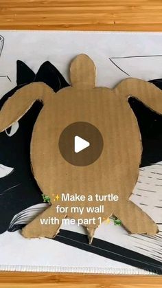 an image of a turtle made out of cardboard with words on the front and bottom