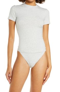 A tried-and-true classic, this fitted T-shirt made from stretch-cotton jersey is from Kim Kardashian's highly sought-out SKIMS. 21 1/2" length (size Medium) Crewneck Short sleeves 90% cotton, 10% elastane Machine wash, tumble dry Imported Sleeveless Turtleneck, Blouse Nordstrom, Cashmere Blend Sweater, Fitted Tee, Wool Turtleneck, Floral Crop Tops, Pattern Sweater, Short Sleeved Sweaters, Heather Gray