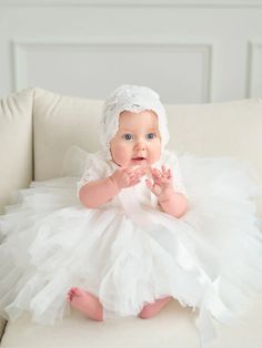 Elegant, ethereal, and utterly enchanting - this girls' christening and birthday dress is a vision in white. Featuring a signature soft lace bodice with delicate half sleeves and a dreamy tiered tulle skirt, it's a timeless style that will make her feel like a true princess on her special day. This beautiful dress is the perfect choice for christenings, birthdays, or any formal occasion. The luxurious lace and airy tulle create an elegant, feminine look that will have her feeling confident and c Lace Short Dress, Baby Christening Outfit, Tiered Tulle Skirt, Girls Communion Dresses, Girls Crown, Flower Girl Crown, Girls Pageant Dresses, Christening Dress, Elegant Feminine