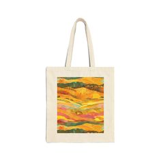 This 100% cotton canvas tote bag showcases a beautiful yellow landscape collage, making it a stylish and practical choice for daily use. With its durable construction and eco-friendly design, it's perfect for shopping, trips to the market, carrying your essentials and more FEATURES - Material: 100% cotton canvas - Dimensions: 15" x 16" (38.1 cm x 40.6 cm)  - Heavy fabric (12 oz/yd² or 406.9 g/m²) for long-lasting durability - 20" (50.8 cm) sturdy handles made from the same canvas - Sewn-in label for added authenticity - Available in natural or black canvas - Lightweight yet strong enough for a week's worth of groceries - Eco-friendly, reusable tote bag - Unique yellow landscape collage art, perfect for art lovers - Ideal for everyday use or as a gift Artistic Yellow Tote Bag, Yellow Cotton Canvas Travel Bag, Yellow Artistic Bag For Daily Use, Yellow Eco-friendly Cotton Bag, Artistic Yellow Bag For Daily Use, Yellow Cotton Tote Canvas Bag, Yellow Cotton Canvas Tote Bag, Artistic Multicolor Cotton Bags, Yellow Cotton Gift Bag