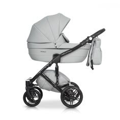 a white baby stroller with black wheels and an infant seat in the back ground