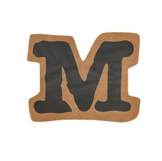 the letter m is made out of cardboard and has black paint on it's upper half