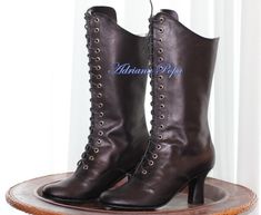 Historical Formal Boots With Round Toe, Historical Round Toe Formal Boots, Historical Round Toe Boots For Formal Occasions, Victorian Style Fitted Leather Boots, Fitted Victorian Leather Boots, Black Victorian Boots With Round Toe, Victorian Black Boots With Round Toe, Victorian Boots With Leather Sole And Round Toe, Victorian Leather Boots With Round Toe