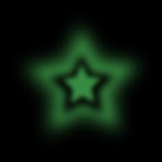 a green star is glowing in the dark