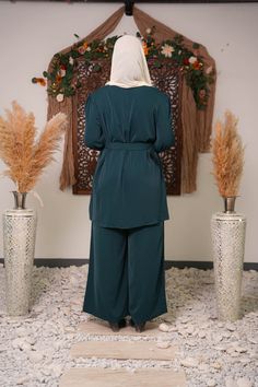 Elevate your modest wardrobe with our Belted Wide Leg Pants Set! This chic ensemble marries modern flair with timeless elegance, ensuring a modest yet stylish look. The set comprises a thigh high tunic with a loose fit for that perfect blend of modesty and fashion. Crafted from premium fabric with a slight stretch, this two-piece set is not only comfortable but also figure-flattering. Two-piece outfit Premium fabric with slight stretch Model is 5'10 and wearing a size S Outwear Outfit, Maxi Cardigan, Outerwear Outfit, Two Piece Outfit, Muslim Fashion, Thigh High