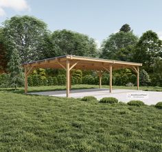 a pavilion in the middle of a grassy area