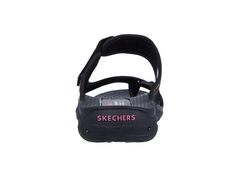 Have some fun with your warm-weather look in the colorful SKECHERS® Reggae - Mad Swag sandal..Nylon fabric upper features a woven finish and multi-color textile panel..Slip-on construction..Open-toe silhouette with toe ring detail..Strap over instep with adjustable hook-and-loop closure for a secure fit..Breathable fabric strap lining..Contoured footbed flaunts arch support and toe ridge for added comfort..Flexible rubber traction outsole..Imported..Product measurements were taken using size 8, Black Nylon Sandals, Casual Multicolor Sport Sandals With Removable Insole, Casual Multicolor Synthetic Sport Sandals, Casual Nylon Sport Sandals With Adjustable Straps, Black Textile Sandals For The Beach, Casual Black Textile Sandals, Skechers Shoes Women, Fabric Strap, Toe Ring