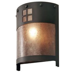 an outdoor wall light with a round glass shade on the top and side panels,