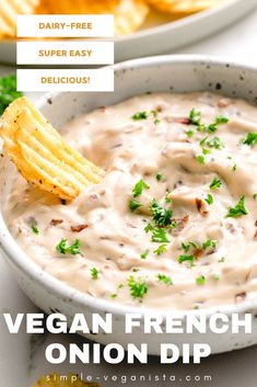 a bowl of dip with chips on the side and text vegan french onion dip