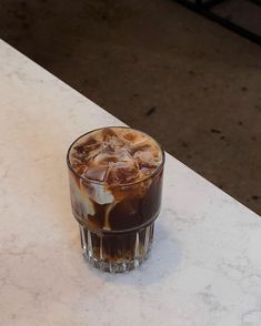 an iced drink sitting on top of a table