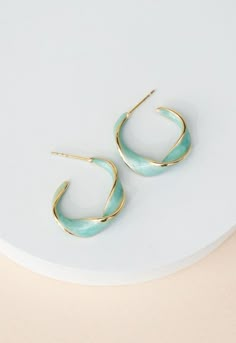 Wear this beautiful pair anywhere from brunch to bridal shower. As the unending compliments roll in share about the incredible impact of your purchase! When you gift (they are the perfect gift!) and wear the With a Twist Hoops you help women and girls establish independence through literacy, math, and computer training. Thank you! Gold Gemstone Jewelry, Mint Accessories, Gold Pulls, Computer Training, Shape Wear, Enamel Earrings, Brass Earrings