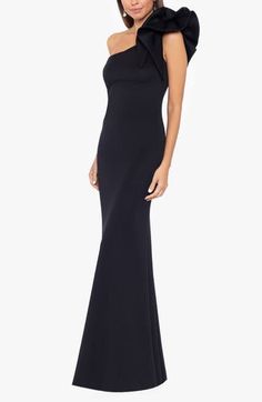 This smooth one-shoulder gown is sure to catch the eye of every onlooker as you pass through the party with a boldly ruffled detail. 58" length Back zip closure One-shoulder neck Single cap sleeve Lined 95% polyester, 5% spandex Dry clean Made in the USA One-shoulder Gown With Sweep Train For Evening, One Shoulder Fitted Evening Gown, One-shoulder Fitted Evening Gown, One-shoulder Evening Gown With Sweep Train, Evening One-shoulder Gown With Sweep Train, Fitted One-shoulder Evening Gown, Evening Gown With Sweep Train And One Shoulder, Evening Dress With Sweep Train And Straight Neckline, One Shoulder Evening Dress With Sweep Train