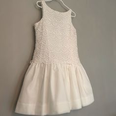 Stunning Floral Embroidery Dress. Effortless Fit-And- Flare-Dress. An Irresistibly Adorable Choice For Any Occasion. White Sleeveless First Communion Dress For Summer, Sleeveless First Communion Dress With Fitted Bodice, Fitted Sleeveless First Communion Summer Dress, Fitted Sleeveless Dress For First Communion In Summer, Fitted Embroidered Dress For First Communion, Embroidered Fitted Dress For First Communion, Spring Fitted Lace Dress For First Communion, Sleeveless Lace First Communion Dress For Spring, Fitted Lace Dress For First Communion In Spring