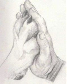 a pencil drawing of two hands holding each other