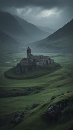 an old castle sits in the middle of a green valley with mountains and dark clouds