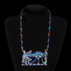 Vintage Unique Egyptian Necklace Eye of Horus Ra Handmade Gemstone Silver from 1975  They are beautiful works of art and craftsmanship, an excellent addition to any collection. Material: Silver, Lapis Lazuli Stone and turquoise stone, Agate Stone Size height: 30.cm   12,inch Size Pendant Eye of Horus: 10x7.cm Weight: 126.Gram  Shipping We Ship from DHL Fast Shipping Is 7 Days with a Tracking Number  Thank You for Shopping at Egypatra Store. Ceremonial Pendant Necklace With Jewels, Spiritual Jewel Pendant Necklace, Silver Ankh Necklace For Ceremonial Use, Silver Ankh Necklace For Ceremonial Occasions, Ceremonial Ankh Amulet Necklace, Collectible Ankh Amulet Necklace, Spiritual Pendant Necklace With Jewels, Ceremonial Amulet Necklaces Hallmarked, Ceremonial Amulet Necklace Hallmarked