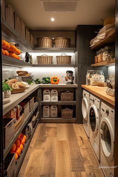 an organized laundry room with wood floors and shelves