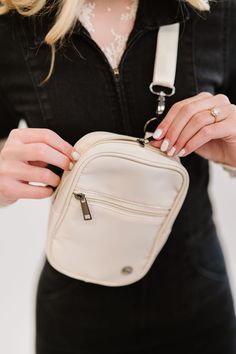 You'll feel empowered to take on whatever the day brings with the Lainey Crossbody as your companion! This multi-wear crossbody bag is convenient, cute, and sized to fit everything you need when you're on the go. The outside features two pockets that are ideal for your smaller essentials (think keys, lip gloss, and gum). The Lainey's interior includes an open compartment to slide your phone in and out of with ease, plus 5 built-in card slots, eliminating the need for carrying a bulky wallet. And Wrap Shoes, Feel Empowered, Pullover Cardigan, Convertible Bags, Dark Khaki, Active Wear Pants, Love To Shop, Black Hardware, Tie Shoes