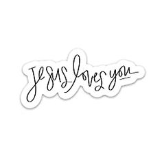 the word jesus loves you written in cursive writing on a white sticker