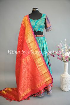 This Turquoise and Royal Blue Kanchi Silk Lehenga with Kanchi Silk Dupatta is a timeless yet elegant fashion essential for any special occasion. Hand-woven with handlooms, the beautiful combination is perfect for brides or special festivals. Add a royal touch to any occasion with this exquisite lehenga set.. Kids Wear Boys, Kids Wear Girls, Block Print Saree, Fancy Gowns, Silk Saree Banarasi, Silk Thread Bangles, Bridal Silk Saree, Silk Lehenga, Silk Dupatta