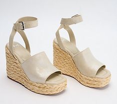 Whoa, Nelly! Fast track your footwear collection for summer savvy style with these espadrille wedges that are ready and willing to elevate your warm-weather wardrobe. From Marc Fisher LTD. Spring Platform Espadrilles In Synthetic, Trendy Espadrille Wedge Sandals For Spring, Spring Wedge Sandals With Round Toe, Trendy Espadrille Heels For Spring, Trendy Summer Espadrille Heels, Trendy Spring Espadrille Heels, Spring Wedge Sandals With Round Toe For Day Out, Round Toe Wedge Sandals For Day Out In Spring, Spring Wedge Sandals For Day Out With Round Toe