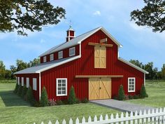 a red barn with a white picket fence