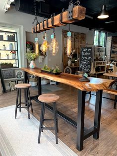 a wooden table sitting inside of a store