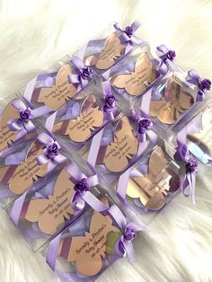 purple and gold heart shaped tags with ribbons