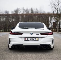 the rear end of a white bmw z4