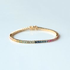 Attract To Your Loved Ones With This Beautiful Rainbow Sapphire Colorful Tennis Bracelet, Round Multi Color Prong Set Bracelet Jewelry, Trendy Bracelet For Women, Handmade Fine Jewelry, Ombre Tennis Bracelet. Great Gift For Christmas, Cyber Sale, Cyber Monday and Black Friday. Octagon Cut Rainbow Sapphire Bracelet 👇 https://www.etsy.com/listing/1530336725 Also available in Yellow Gold, Rose Gold and White Gold. Pretty Gift For Mom, Sister, Friend and Girlfriend. 𝐏𝐫𝐨𝐝𝐮𝐜𝐭 𝐢𝐧𝐟𝐨: 𝟏𝟒𝐤 Multicolor Diamond Bracelet As A Gift, Fine Jewelry Multicolor Wedding Bracelet, Multicolor Bangle Bracelets For Anniversary, Multicolor Fine Jewelry Bracelet For Wedding, Multicolor Multi-stone Gold Bracelet As Gift, Elegant Rainbow Round Bracelets, Fine Jewelry Multicolor Tennis Bracelet With Jubilee Style, Multicolor Fine Jewelry Tennis Bracelet With Jubilee Style, Gold Wedding Bracelet