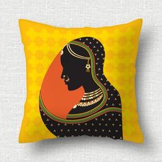 a yellow pillow with an image of a woman